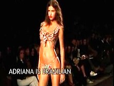 Slender Adriana Lima Walking Along Runway In Suggestive Clothings