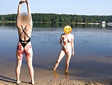 Nudist Girl Goes Skinny Dipping In A Beach