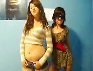 Stunning Young Brunettes Dancing To Music And Stripping