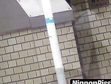 Nipponpisstv. Com - Japanese Babe And Her Friend Piss Together Out In Public Openly