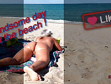 She shows her ass on the beach of Cap d'Agde and jerks off her pussy and then her boyfriend's cock with voyeurs
