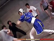 Chun-Li Cosplay Asian Babe groped in large bukkake sex party