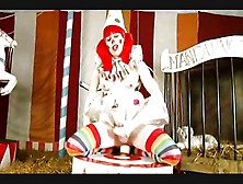 Shemale Clown Takes Huge Dildo At The Circus