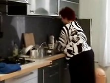 Plump big beautiful woman granny drilled in the kitchen