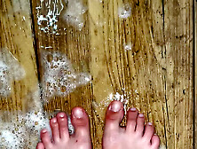 Teen’S Feet Are Caressing In Foam