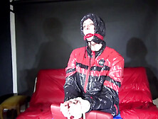 Sexy Pia Being Tied And Gagged On A Chair Wearing Sexy Shiny Nylon Rainwear (Video)