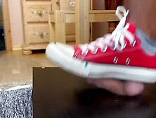 Ball crush with red Converse Chucks