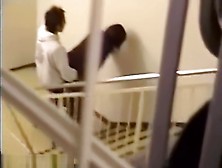 Couples flirting inside of a building