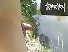 Naked Twink In The River Is Pissing And Cumming