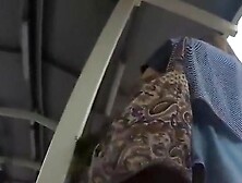 Sexy upskirt of a leggy young girl