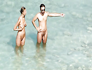 Spy Cam blowjobs on public nude beach