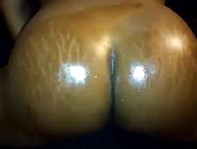 Fat black ass in oil gets hard from the bottom