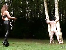 Mastix ties serf to tree and whips him previous to banging bbc