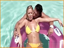 Blonde Gets Naughty In A Pool