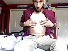 Handsome young Brian Bonerz is in his bedroom watching porn on the bed