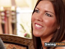 Swinger husbands talk to swap their beautiful wives in a full partner swap after a horny game.