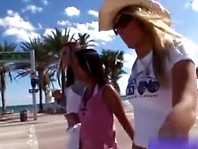 lesbians friends on the store and beach