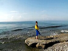 Dancing On Mediterranian Sea Beach With Yellow-Blue Shawl