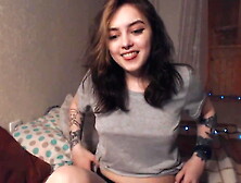 Brunette tattoo babe takes off her clothes on webcam