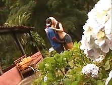 Interracial Couple In The Garden