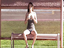 Hot chick is masturbating in the street