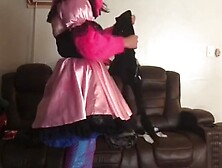 Sissy maid folds clothes