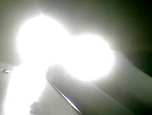 A fit milf is getting dresed in a sport club changing room