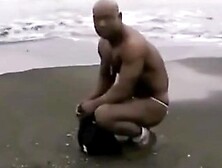 Asian Bodybuilder Barely Covered At The Beach