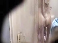 Spy Shower Cam Gets Mature Girl Showering