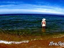 In nature's garb mama bathing bare in the sea