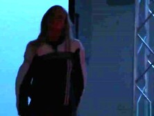 Busty chick stripping and dancing in front an audience