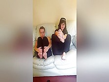 Teenage Girlfriends In Black Outfits Showing Off Their Delicious Feet Together