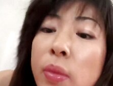 Titty fucking chinese MILF babe jerks cock
