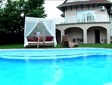 Blond Poolside Footjob and Juicy Tease