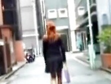 Glamorous red-hot oriental sweetie flashes her ass when her outfit get lifted