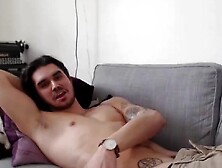 Young Gay Man Relaxes On His Couch And Touches His Cock In A Live Show