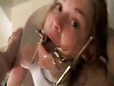 Blonde With A Mouth Clamp Face Fucked And Gaggging