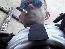 Hairy Man In Leather Cop Uniform Enjoys Pissing Outdoors