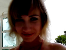 Long-legged doll takes her sexy high-heels off and gives a footjob