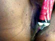 Sexually excited Black rubs her love button with a tripod that babe creams hard and has a rock hard climax