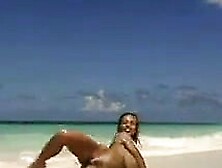 Busty Babe At The Beach