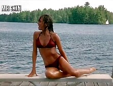 Sexy Woman In Red Two Piece Swims While Waiting For A Boat.