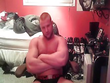 Bodybuilder Posing Off His Muscle