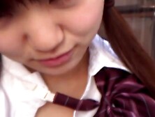 Japanese schoolgirl licking and sucking in closeup