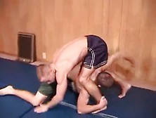 Asst Coach Wrestles Student