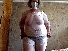 Trying on recent white pants.  A aged big beautiful woman shakes her large booty.  PAWG.