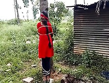 Indian Girl Tied To A Tree