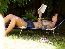 Liandra Dahl touches herself outside