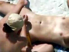 stepdaughter milks cock on beach (voyeur)