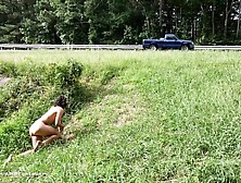 Crawling completely naked in public next to the road